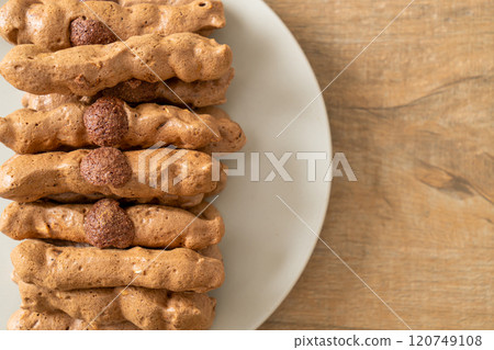 chocolate meringue stick on plate 120749108