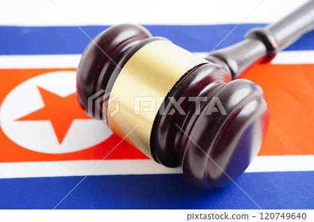 North Korea, Legal, justice and agreement, wooden court gavel on flag. North Korea, Legal, justice and agreement, wooden court gavel on flag. 120749640