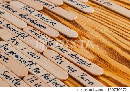 Positive thoughts for increasing selfesteem on wooden posts on wooden background Positive thoughts for increasing selfesteem on wooden posts on wooden background 120750072