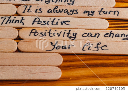 Positive thoughts for increasing selfesteem on wooden posts on wooden background 120750105