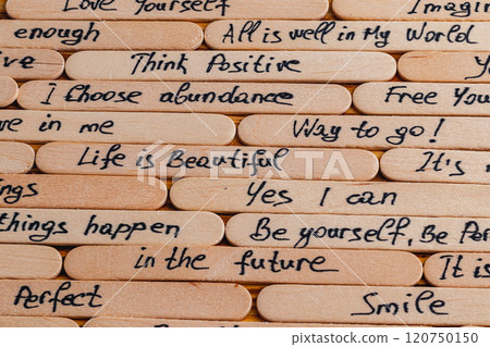Positive thoughts for increasing selfesteem on wooden posts on wooden background 120750150