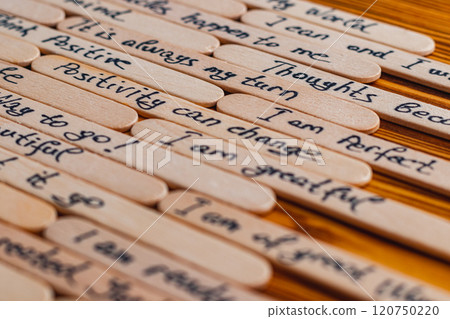 Positive thoughts for increasing selfesteem on wooden posts on wooden background Positive thoughts for increasing selfesteem on wooden posts on wooden background 120750220