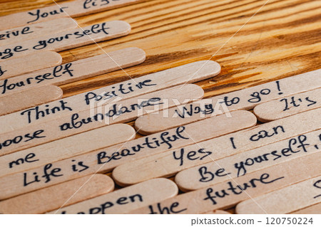 Positive thoughts for increasing selfesteem on wooden posts on wooden background 120750224