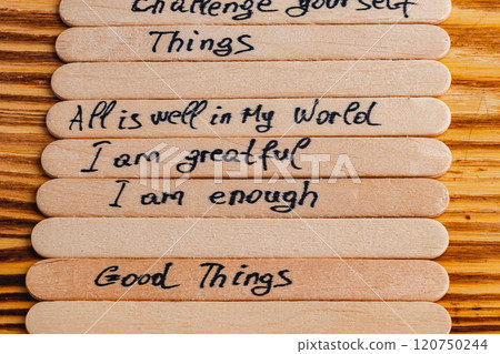 Positive thoughts for increasing selfesteem on wooden posts on wooden background Positive thoughts for increasing selfesteem on wooden posts on wooden background 120750244