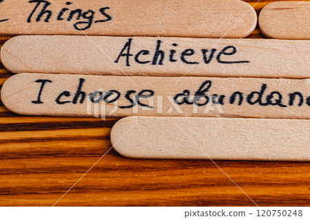 Positive thoughts for increasing selfesteem on wooden posts on wooden background Positive thoughts for increasing selfesteem on wooden posts on wooden background 120750248