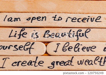 Positive thoughts for increasing selfesteem on wooden posts on wooden background Positive thoughts for increasing selfesteem on wooden posts on wooden background 120750249