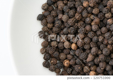Close up of whole black peppercorns Close up of whole black peppercorns 120751000