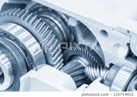 Close up scene the cutaway transmission gear parts in the light blue scene. Close up scene the cutaway transmission gear parts in the light blue scene. 120754052