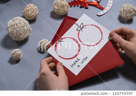 Christmas balls Gift Christmas idea. Do it yourself instruction postcard eco-friendly decoration. Making handmade presents children's diy projects. Holiday family time 120754397