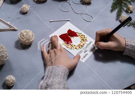 Christmas wreath Sustainable Christmas preparation Diy process of making handmade greeting cards. Step by step activity for children. Inclusive and responsible stress relief holiday hobby 120754400