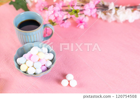 Ramune and coffee piled high on a small plate Ramune and coffee piled high on a small plate 120754508