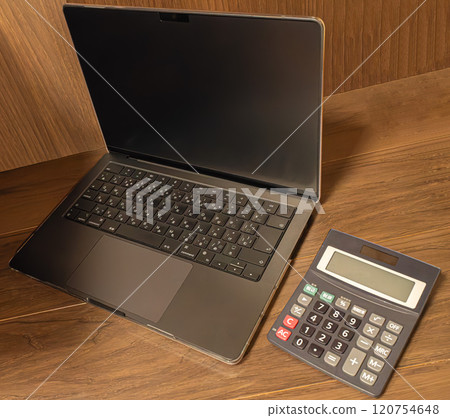 Laptop and calculator 120754648