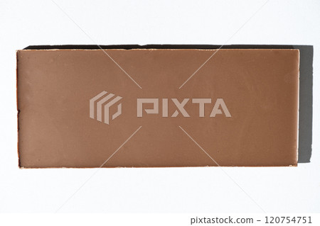 Texture milk chocolate bar on white background top view 120754751