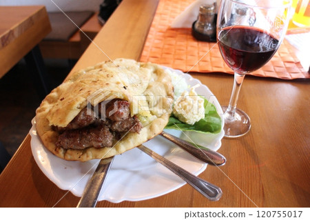 Bosnian cuisine at Cevapi restaurant in Mostar Bosnian cuisine at Cevapi restaurant in Mostar 120755017