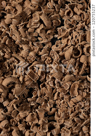 Grated natural organic chocolate shavings macro 120755237