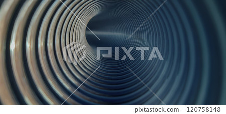 Corrugated tunnel. View from inside. The curved, illuminated interior of the pipeline. 120758148