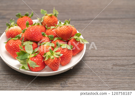Strawberries on a plate 120758187