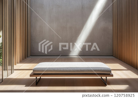 Minimalist interior space with wooden bench and natural light streaming in 120758925