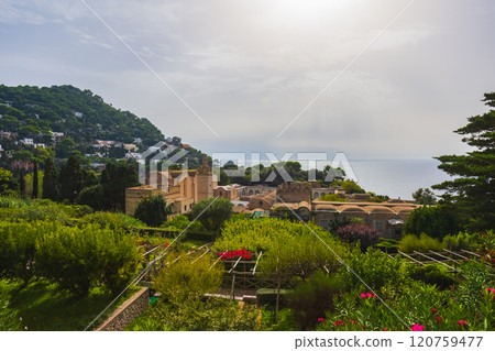 A Scenic Coastal View featuring Lush Green Gardens alongside Historical Ancient Ruins in a Capri island 120759477