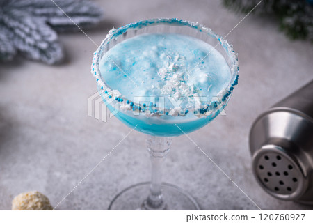 Christmas cocktail with blue curacao Christmas cocktail with blue curacao 120760927