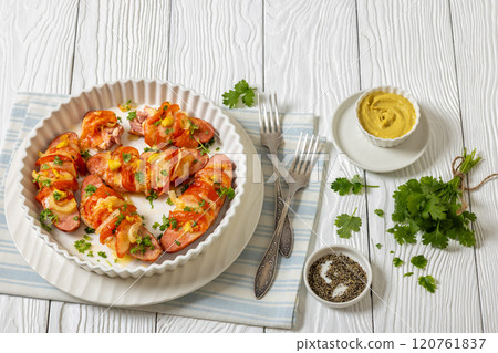 hot sausages baked with cheese, tomato, mustard hot sausages baked with cheese, tomato, mustard 120761837