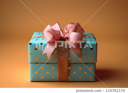 Luxury craft packaging gift box tied golden ribbon blue glitter, shine background, copy space 120762170