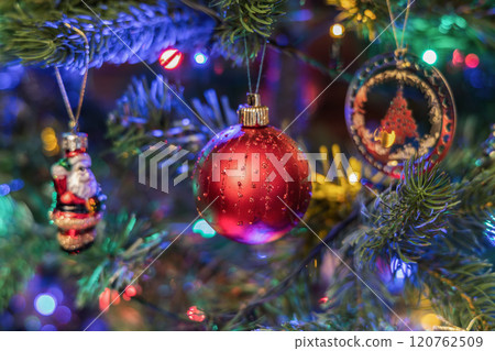 Christmas tree decorated with balls and gerland. 120762509