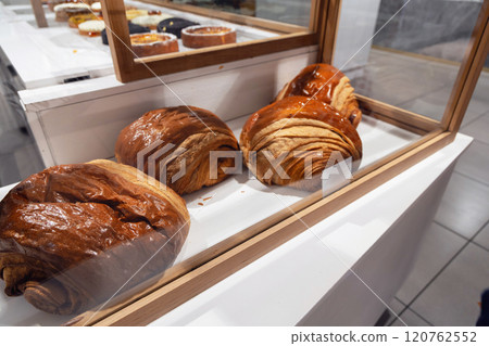 Various baked goods on display in a bakery Various baked goods on display in a bakery 120762552