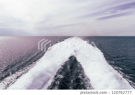Water trail behind cruise ship. 120762777