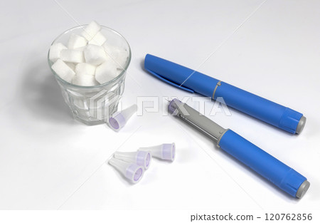 Hands in surgical gloves holding Ozempic Insulin injection pen for diabetics. Hands in surgical gloves holding Ozempic Insulin injection pen for diabetics. 120762856