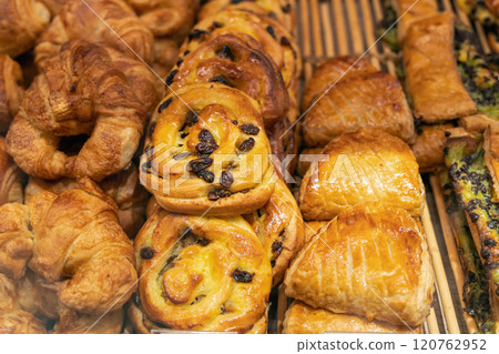 Various assortment of desserts confectionery on the counter in a bakery Various assortment of desserts confectionery on the counter in a bakery 120762952