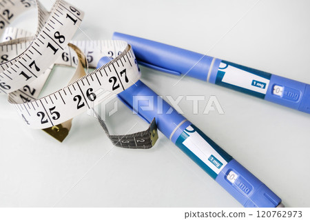 Ozempic Insulin injection pen for diabetics. Concept of losing weight with the drug. Ozempic Insulin injection pen for diabetics. Concept of losing weight with the drug. 120762973