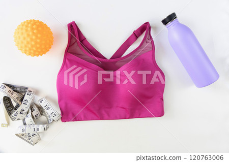 Concept of sports lifestyle and sports activities. Flat lay of sports top bra and drinking bottle. 120763006