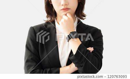 A young woman/businesswoman thinking 120763093