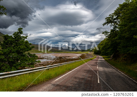 Abandoned Street To Applecross Pass With River Allt a'Chumhaing In Scotland, UK 120763201