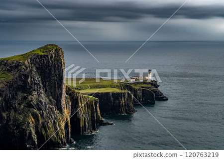 Spectacular Cliffs And Light House On Neist Point At The Atlantic Coast Of The Isle Of Skye In Scotland, UK Spectacular Cliffs And Light House On Neist Point At The Atlantic Coast Of The Isle Of Skye In Scotland, UK 120763219