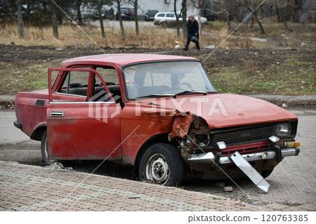 Front of black car get damaged by accident on road 120763385