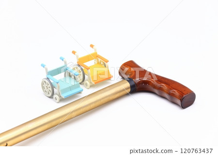 Image of a walking stick and wheelchair Image of a walking stick and wheelchair 120763437