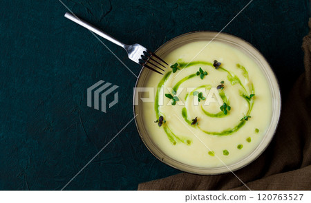 Mashed potatoes, with green butter, micro greenery, homemade, on a dark background, no people, top view, 120763527