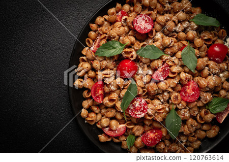 Tuscan pasta with smoked paprika and basil,parmesan cheese, Italian traditional cuisine, Tuscan pasta with smoked paprika and basil,parmesan cheese, Italian traditional cuisine, 120763614