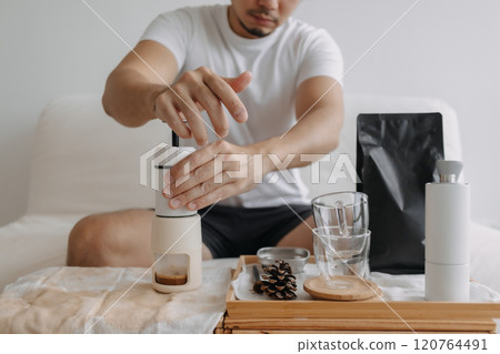 Step by step of man making espresso with hand press tools. Step by step of man making espresso with hand press tools. 120764491