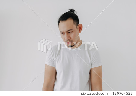 Shrug whatever face man in white t-shirt isolate on white. 120764525