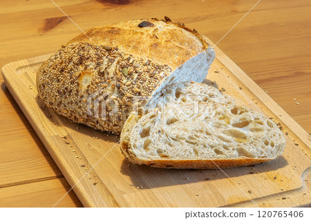 Homemade bread, sourdough wheat loaf with seeds Homemade bread, sourdough wheat loaf with seeds 120765406