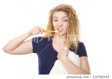 Sleepy woman hugging white pillow 120766244
