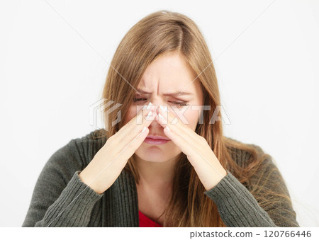 Young woman with painful sinus ache 120766446