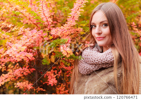 Fashionable girl outdoors. Autumn 120766471