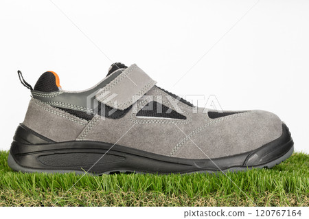 Gray Safety Shoe on Artificial Grass 120767164