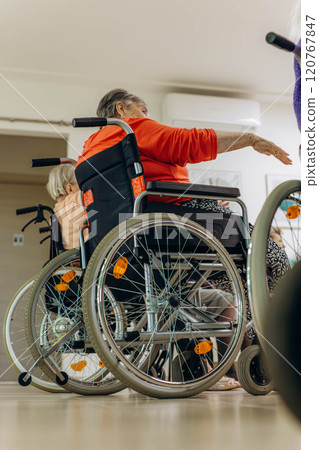 Group of elderly people in a nursing home spending time  120767847