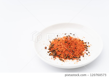 Shichimi pepper in a plate 120768573
