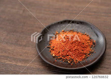Shichimi pepper in a small dish 120768632